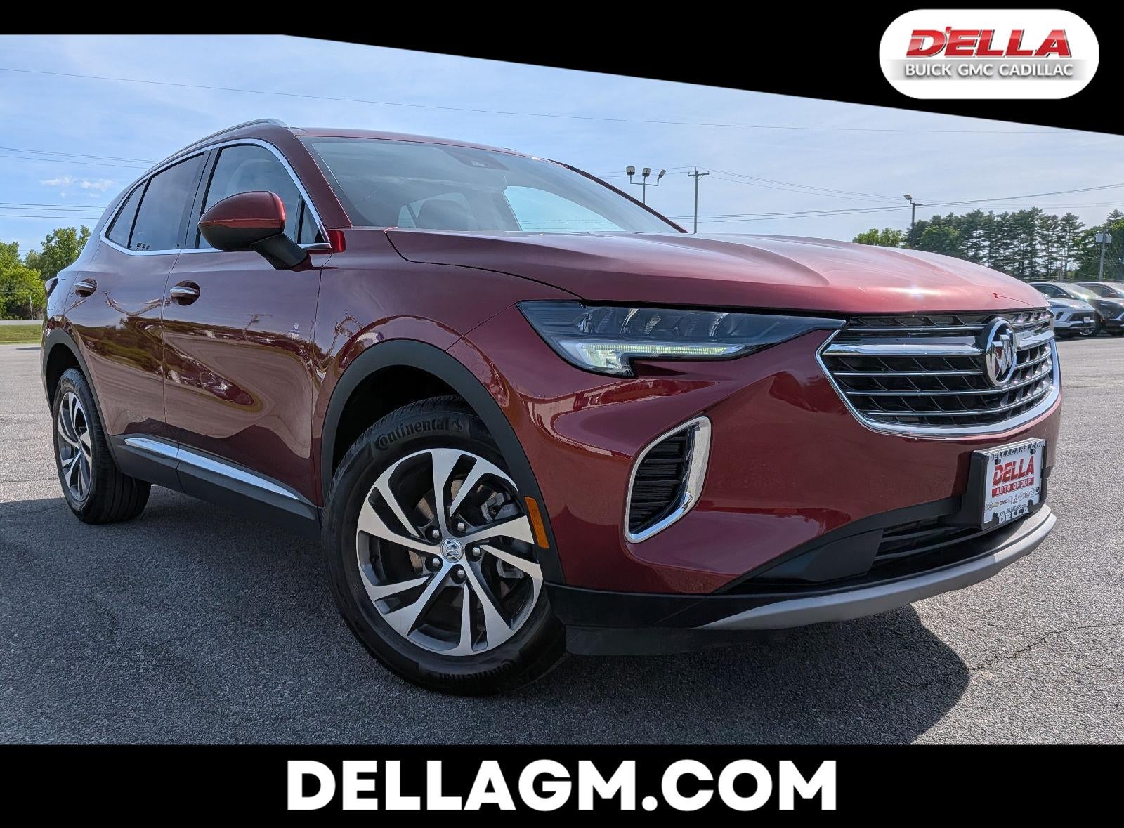 2023 Buick Envision Essence in Cinnabar Metallic — front three-quarter view