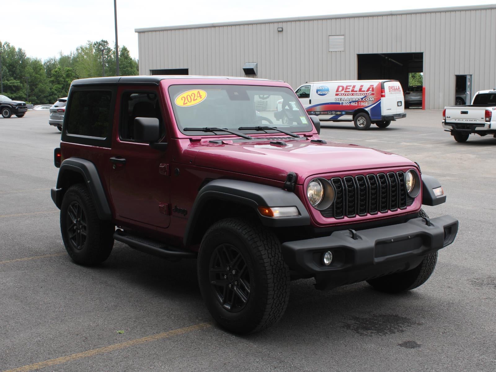 2024 Jeep Wrangler — rear three-quarter view