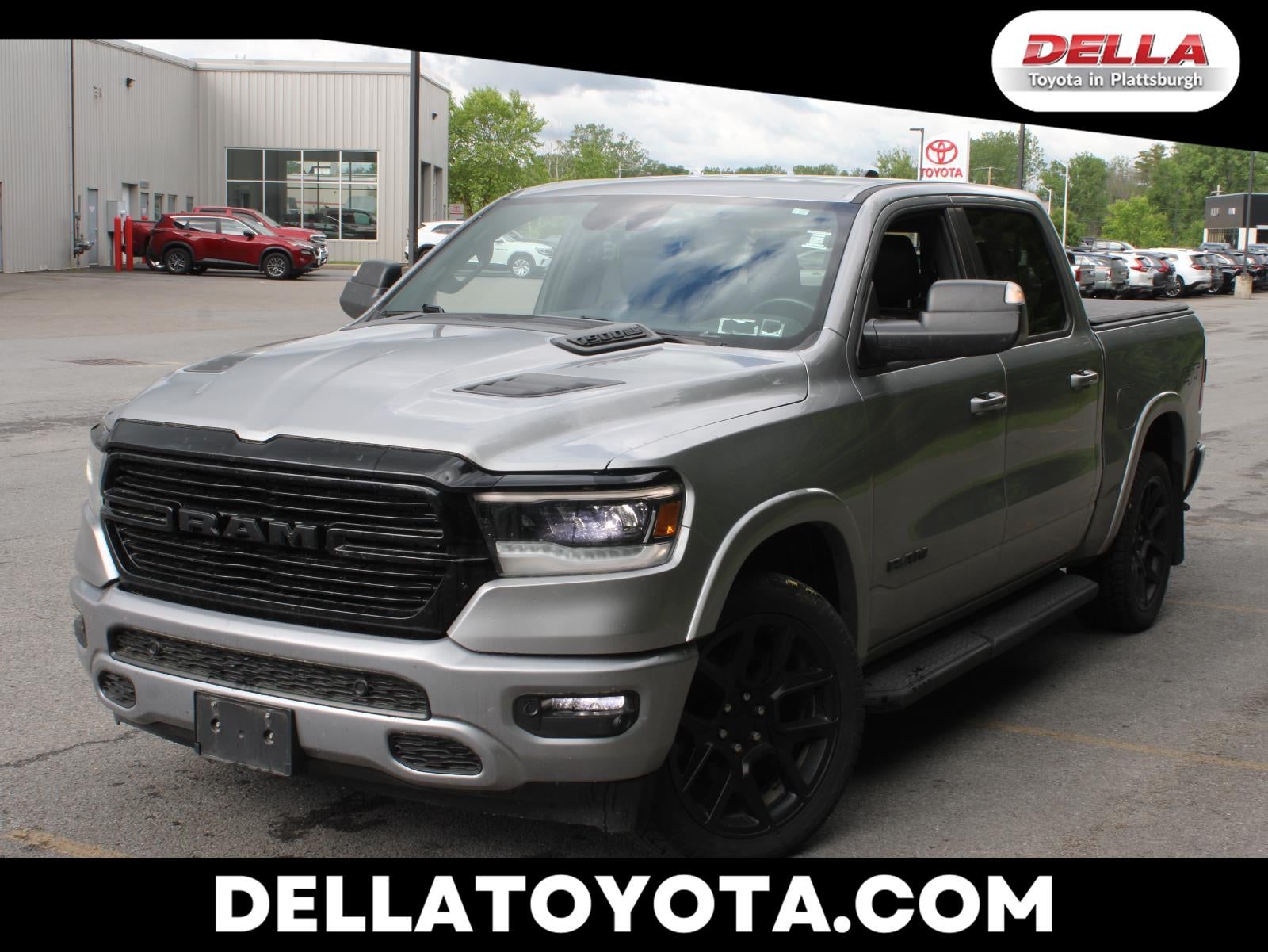 2022 RAM 1500 Laramie in Billet Silver Metallic Clearcoat — front three-quarter view