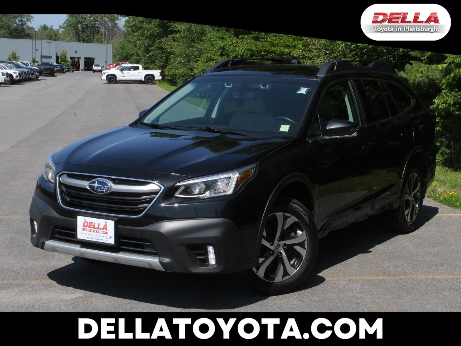 2022 Subaru Outback Limited in Crystal Black Silica — front three-quarter view