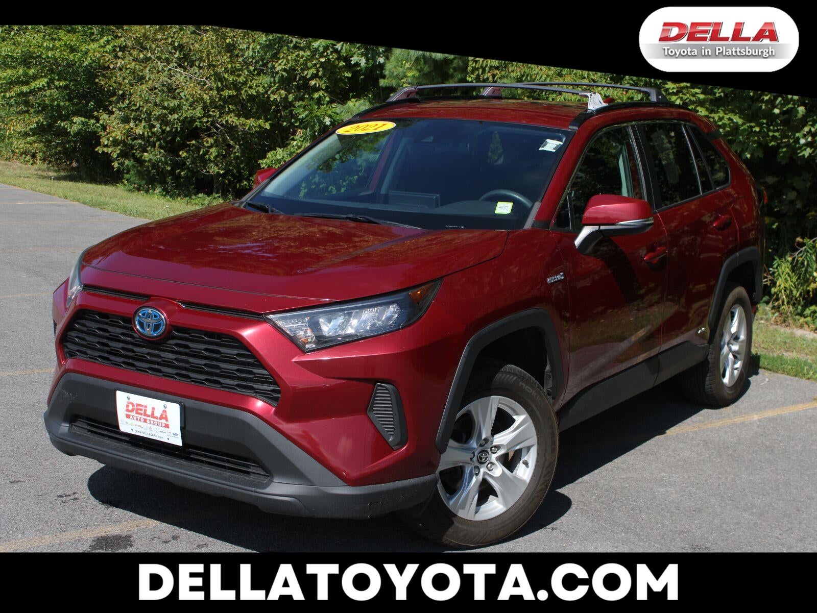 2021 Toyota RAV4 Hybrid LE in Ruby Flare Pearl — front three-quarter view
