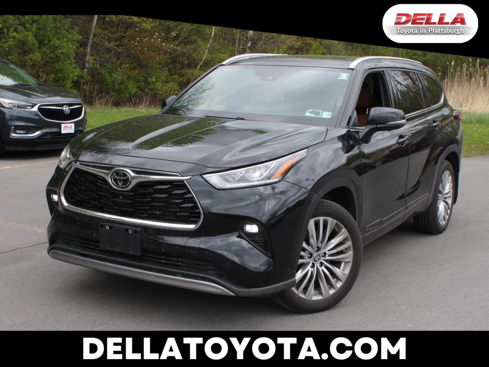 2024 Toyota Highlander Platinum in Midnight Black Metallic — front three-quarter view