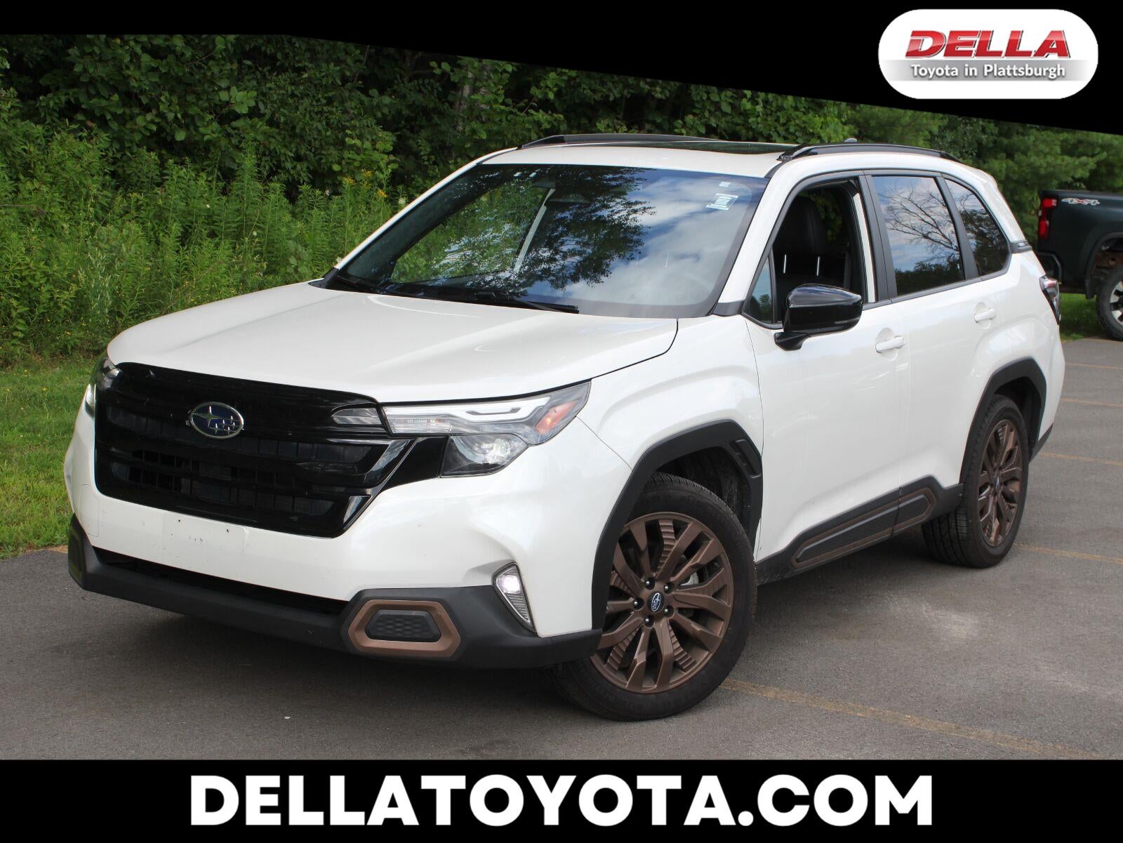 2025 Subaru Forester Sport in Crystal White Pearl — front three-quarter view