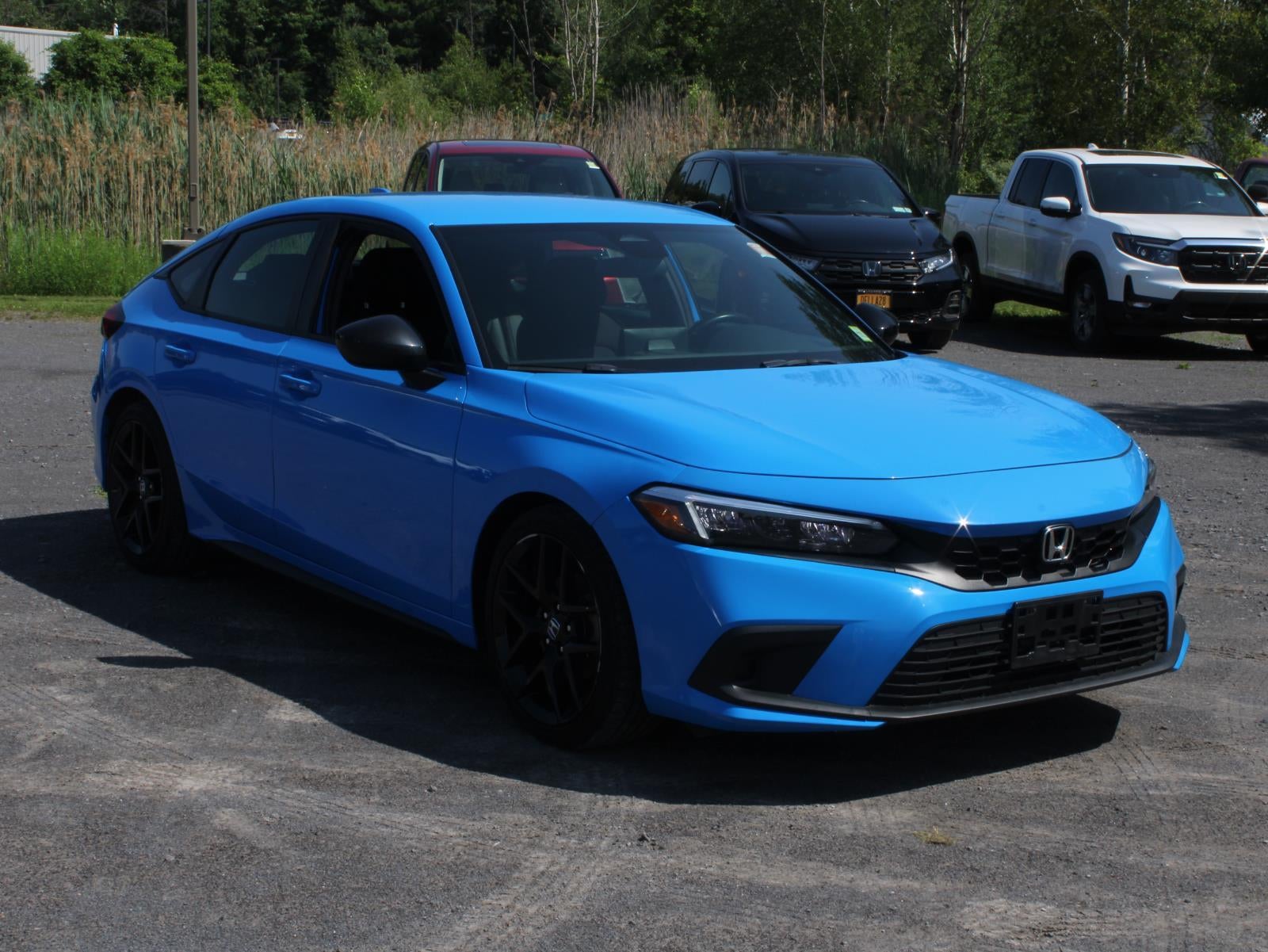 2023 Honda Civic Hatchback — rear three-quarter view