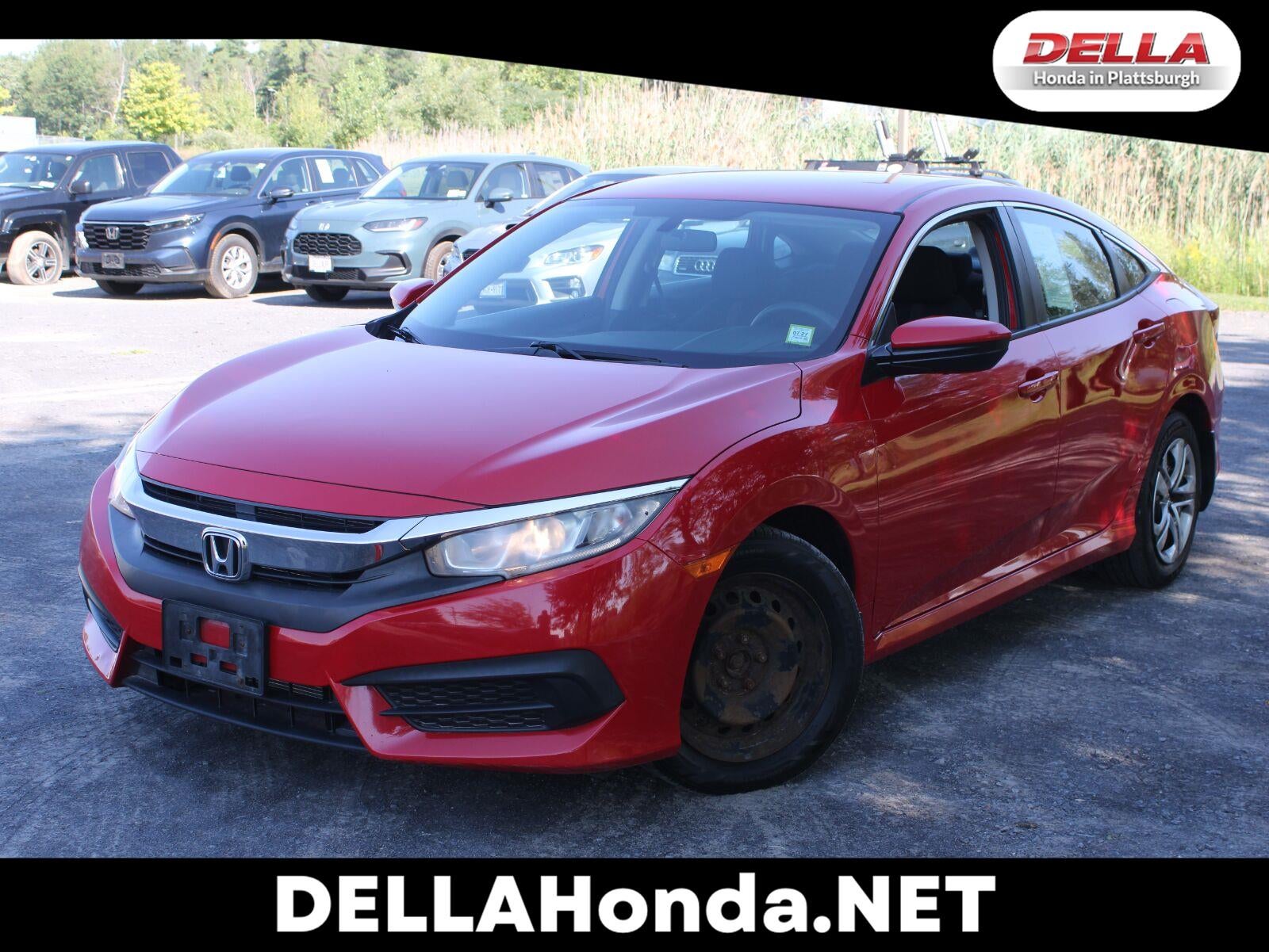 2017 Honda Civic Sedan LX in Rallye Red — front three-quarter view