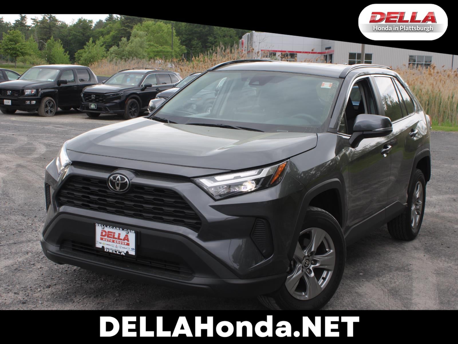 2025 Toyota RAV4 LE in Magnetic Gray Metallic — front three-quarter view