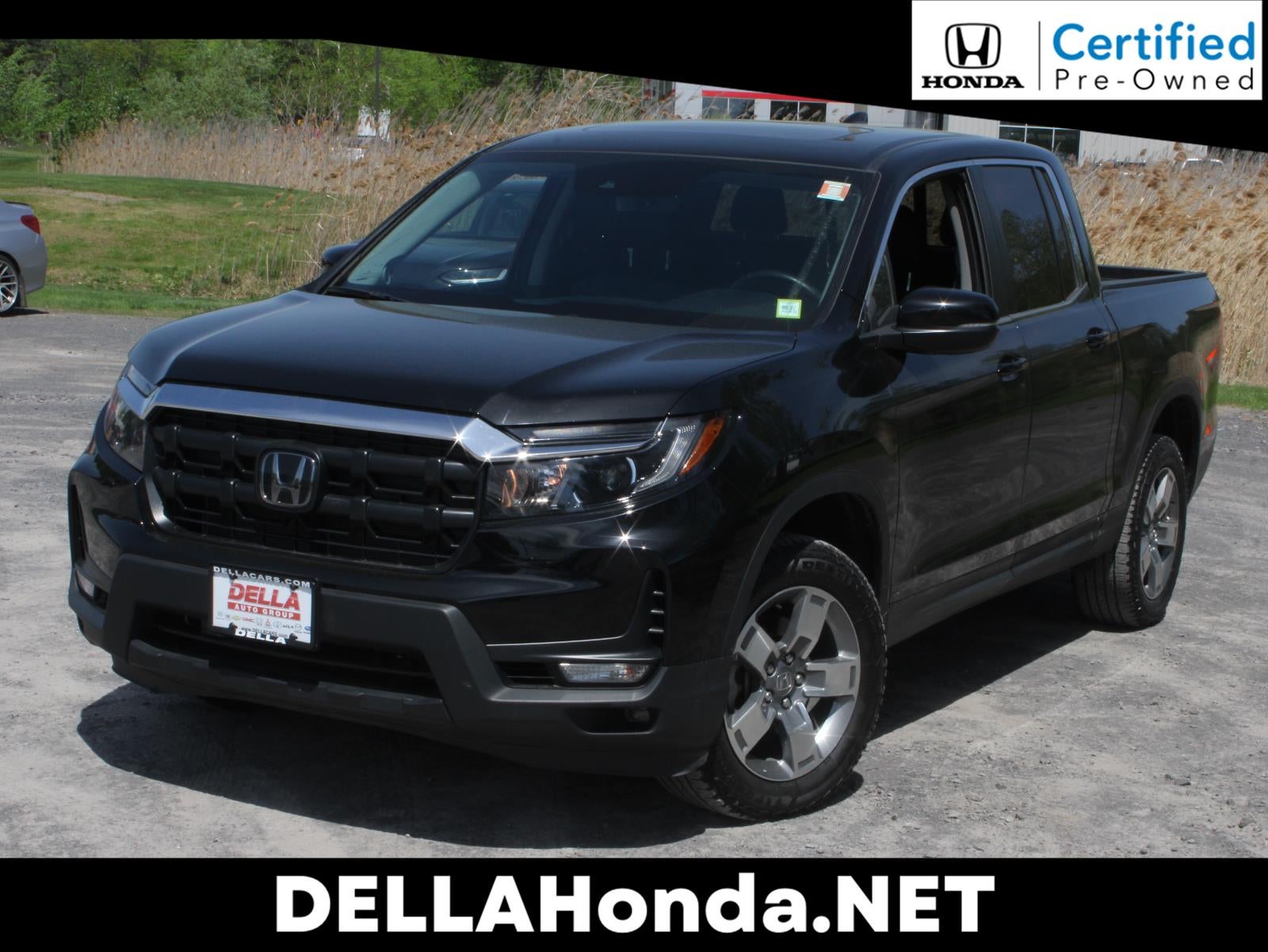 2025 Honda Ridgeline RTL in Crystal Black Pearl — front three-quarter view