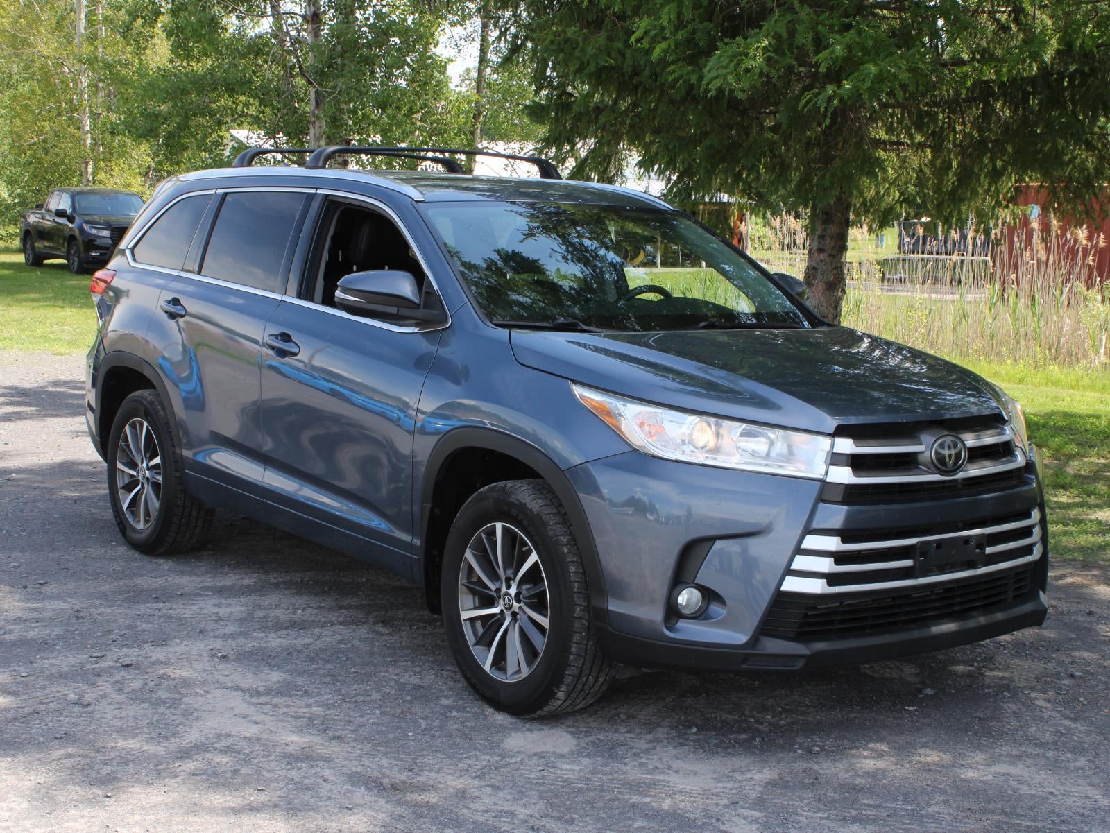 2018 Toyota Highlander — rear three-quarter view