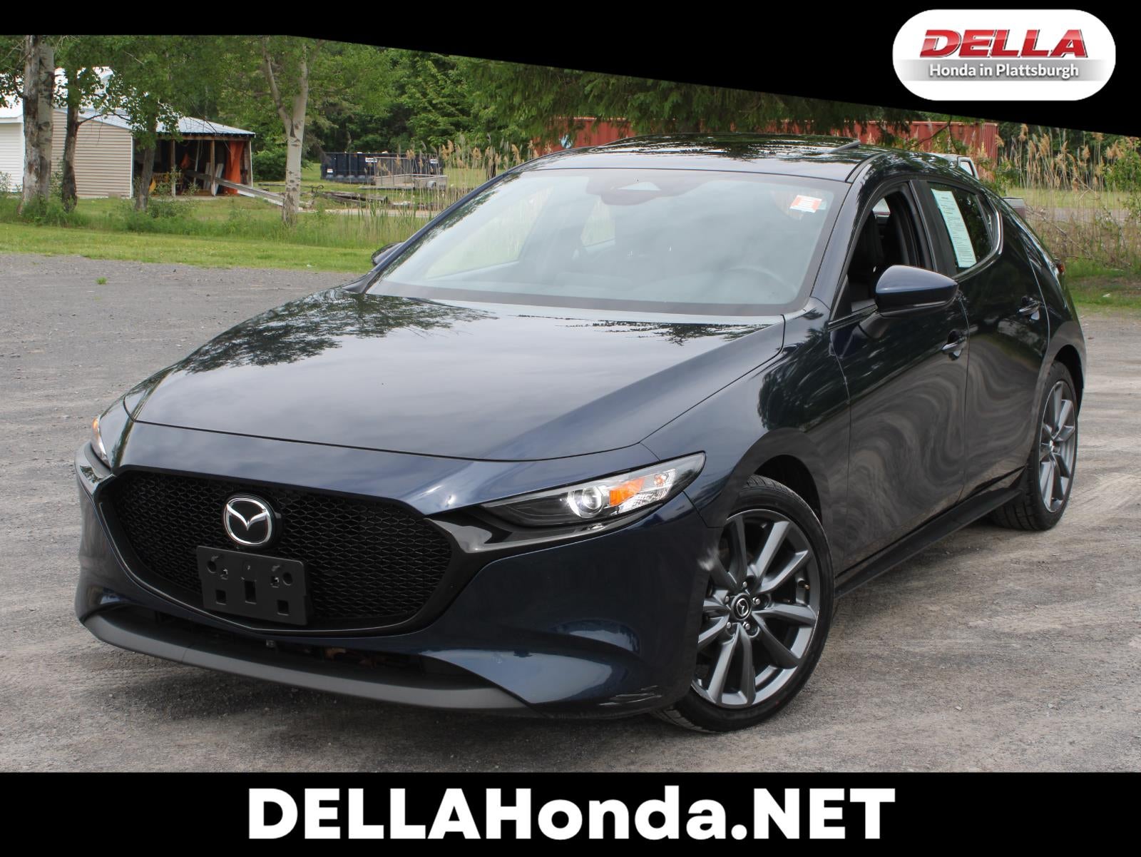 2024 Mazda Mazda3 Hatchback Preferred in Deep Crystal Blue Mica — front three-quarter view