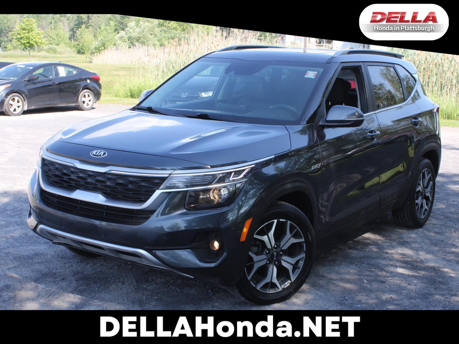 2021 Kia Seltos EX in Gravity Gray — front three-quarter view