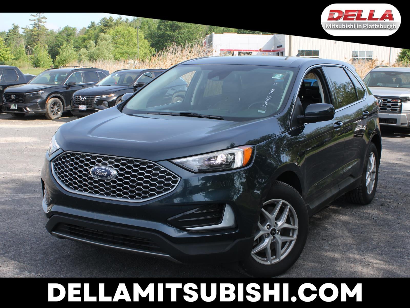2024 Ford Edge SEL in Stone Blue Metallic — front three-quarter view