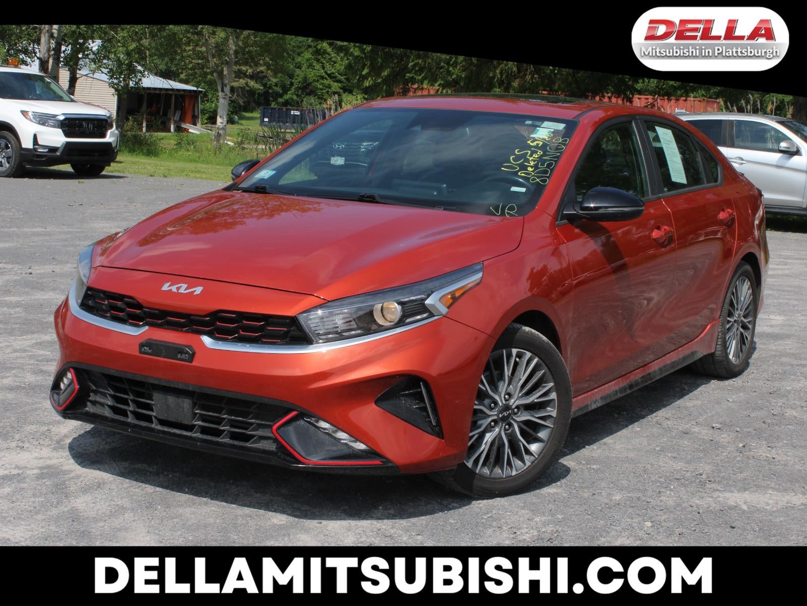 2023 Kia Forte GT-Line in Fire Orange — front three-quarter view