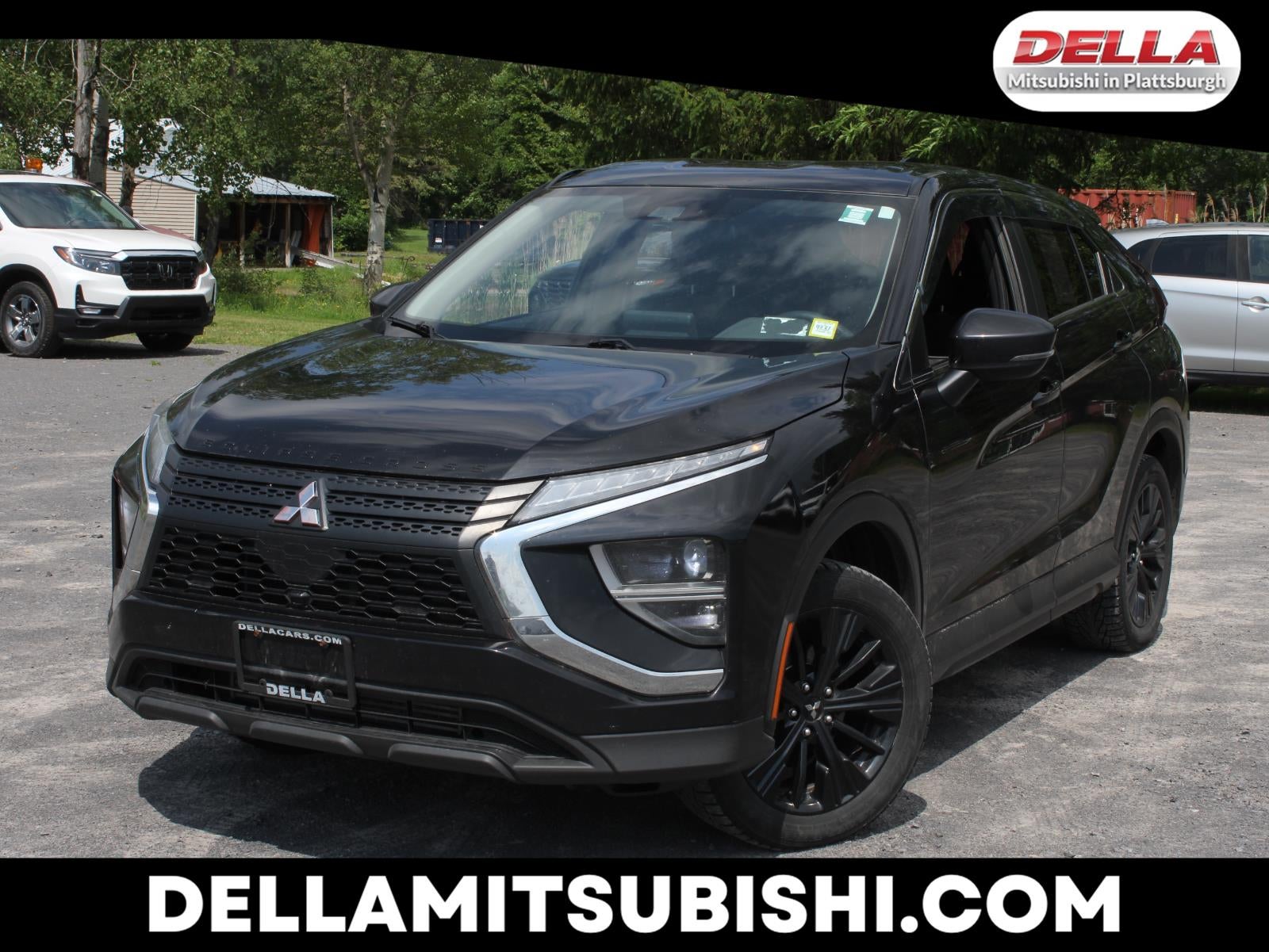 2022 Mitsubishi Eclipse Cross LE in Labrador Black Pearl — front three-quarter view