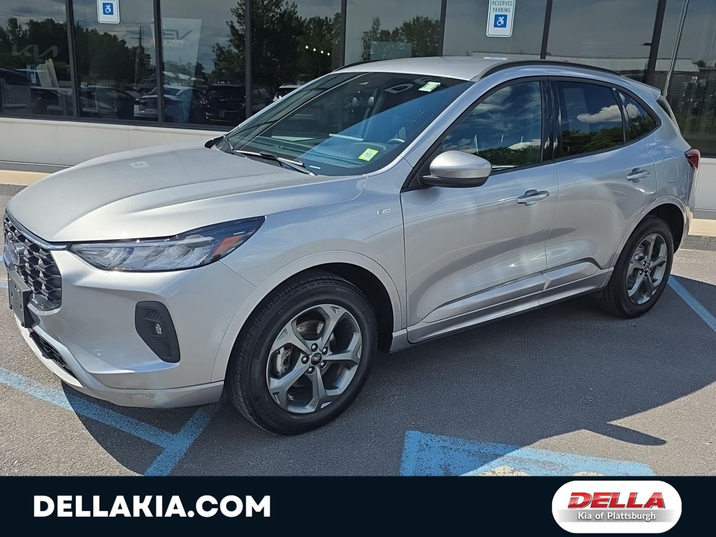 2023 Ford Escape ST-Line Select in Iconic Silver Metallic — front three-quarter view