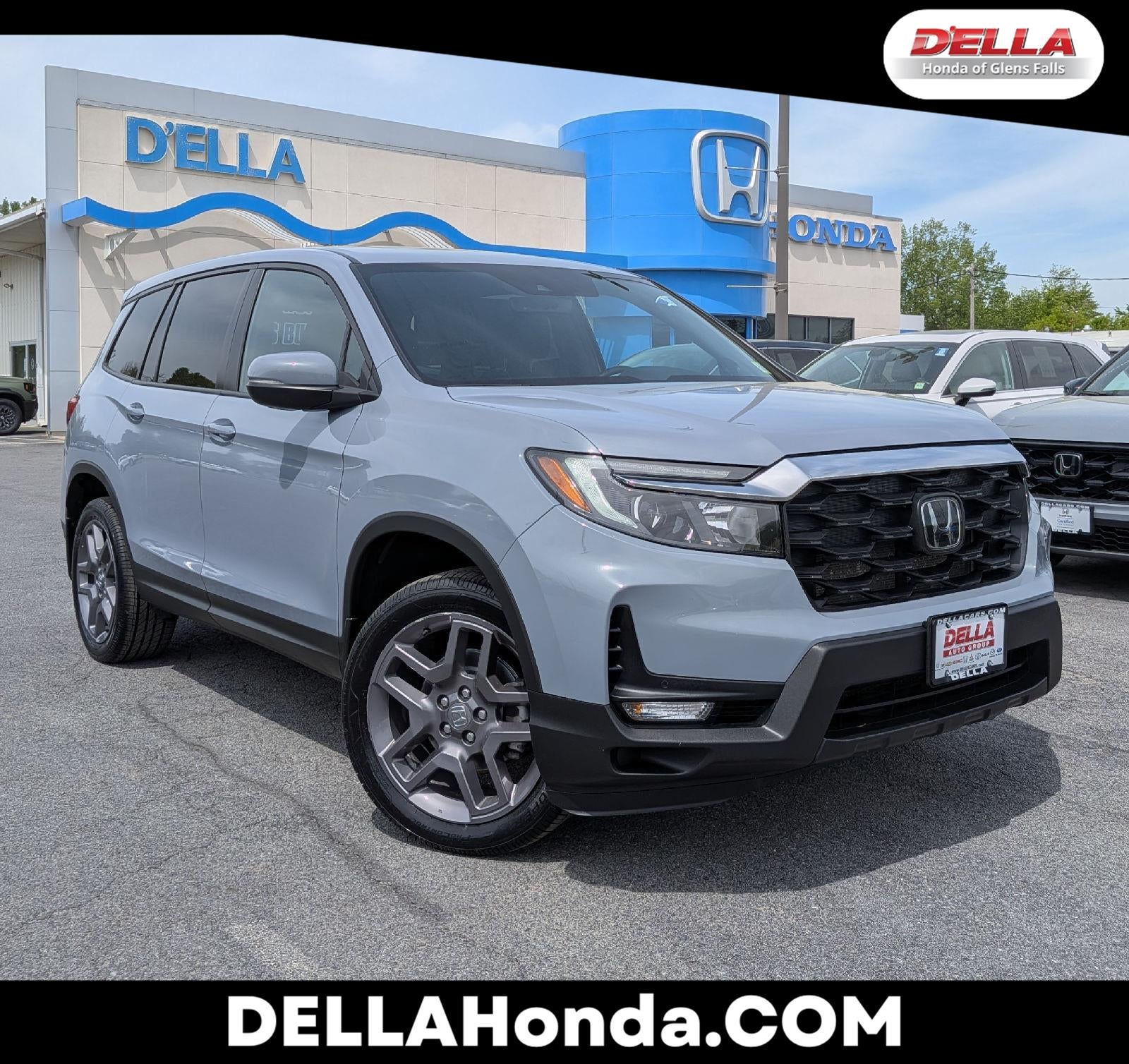2023 Honda Passport EX-L in Sonic Gray Pearl — front three-quarter view