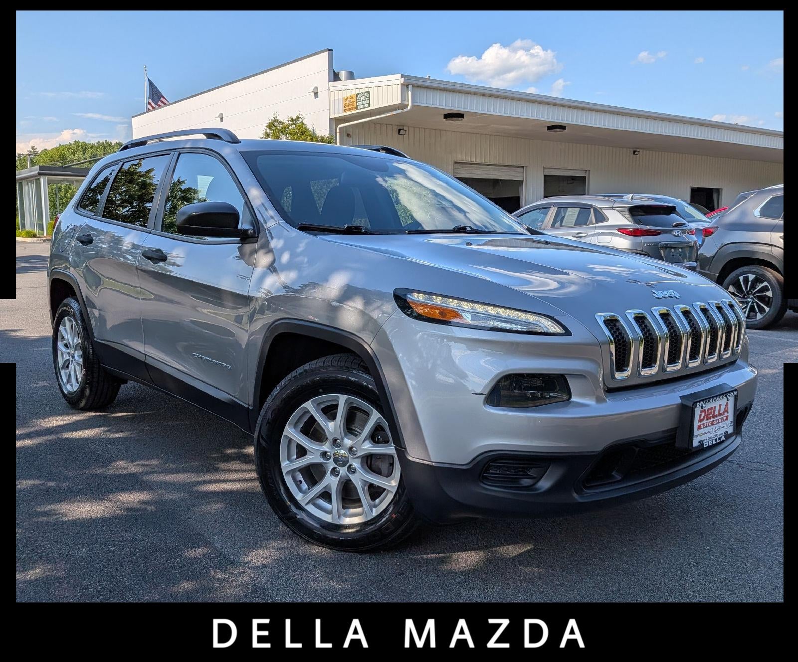 2016 Jeep Cherokee Sport in Billet Silver Metallic Clearcoat — front three-quarter view