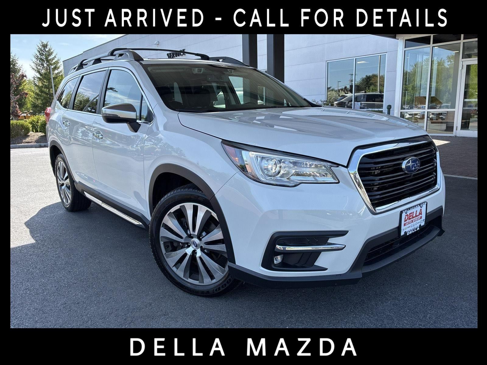 2021 Subaru Ascent Touring in Crystal White Pearl — front three-quarter view