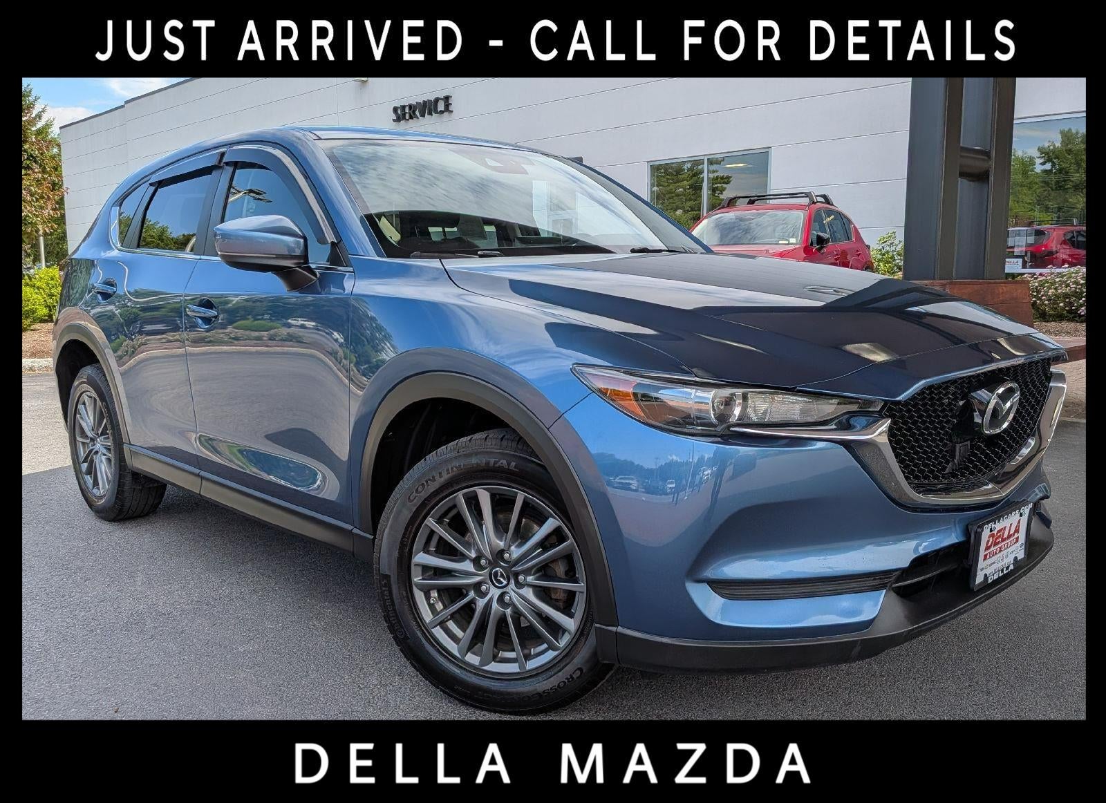 2017 Mazda Mazda CX-5 Touring in Blue — front three-quarter view