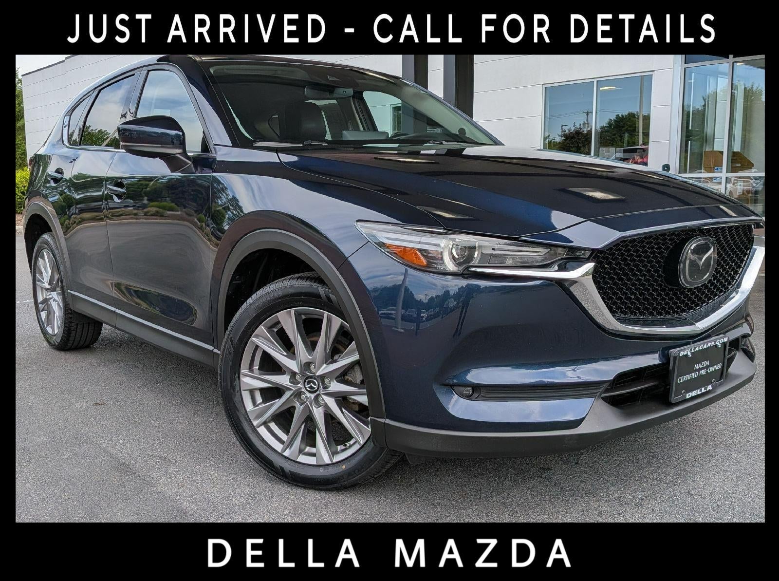 2021 Mazda Mazda CX-5 Grand Touring in Blue — front three-quarter view