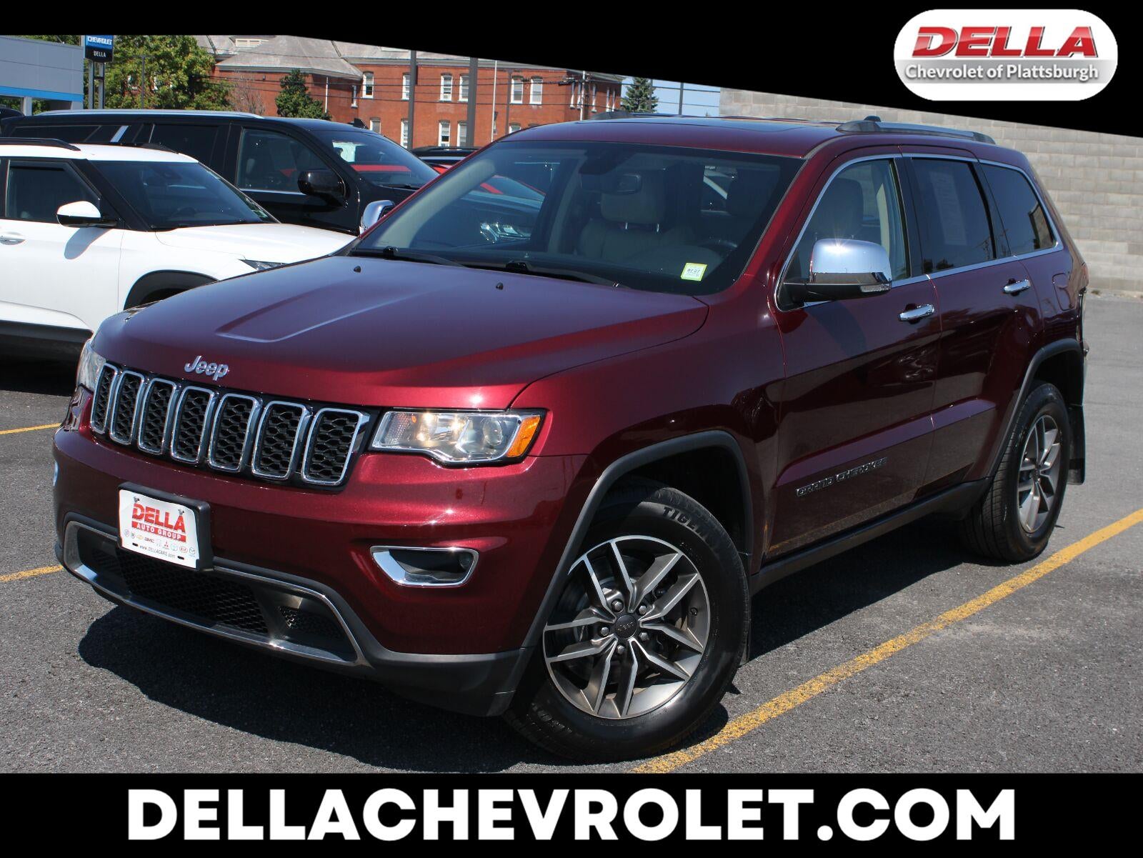 2021 Jeep Grand Cherokee Limited 4x4 in Red — front three-quarter view