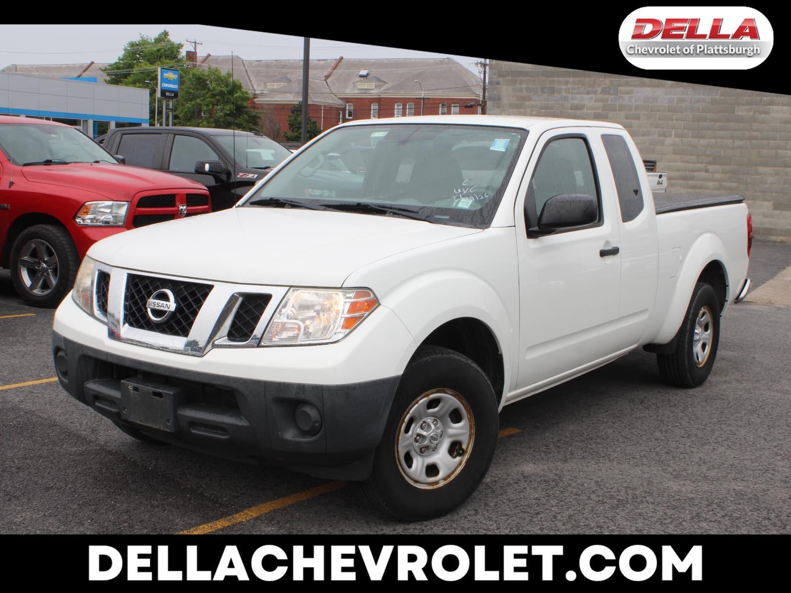 2016 Nissan Frontier S in White — front three-quarter view