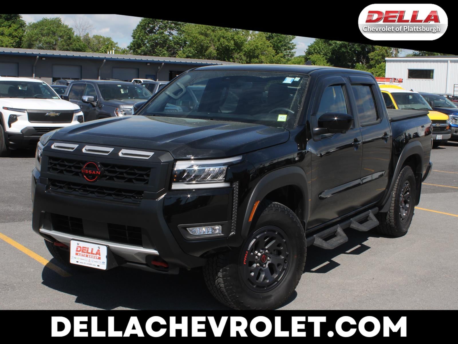 2025 Nissan Frontier Crew Cab PRO-4X 4x4 in Black — front three-quarter view